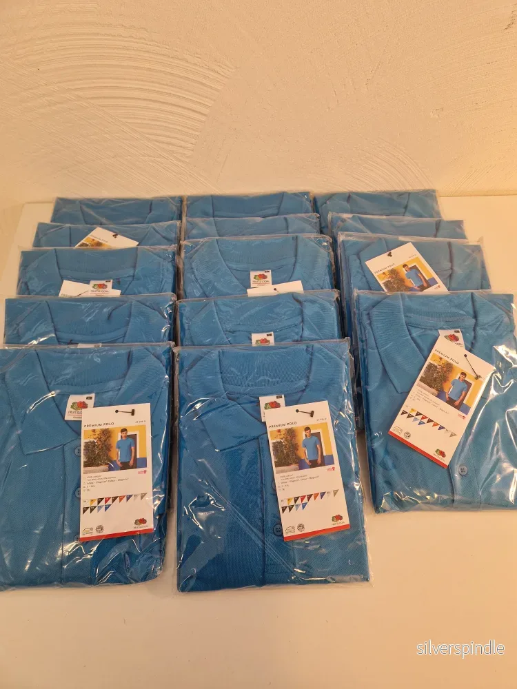 Pikétröja nya i förpackning.