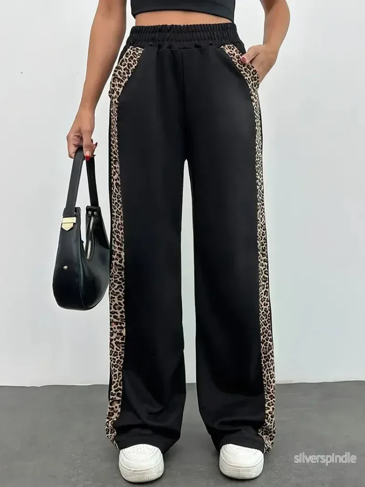 Dynamisk Leopard | Joggingbyxor Dam med Elastisk Midja | Bekväm Design för Aktiv Livsstil Dynamisk Leopard | Joggingbyxor Dam med Elastisk Midja | Bekväm Design för Aktiv Livsstil