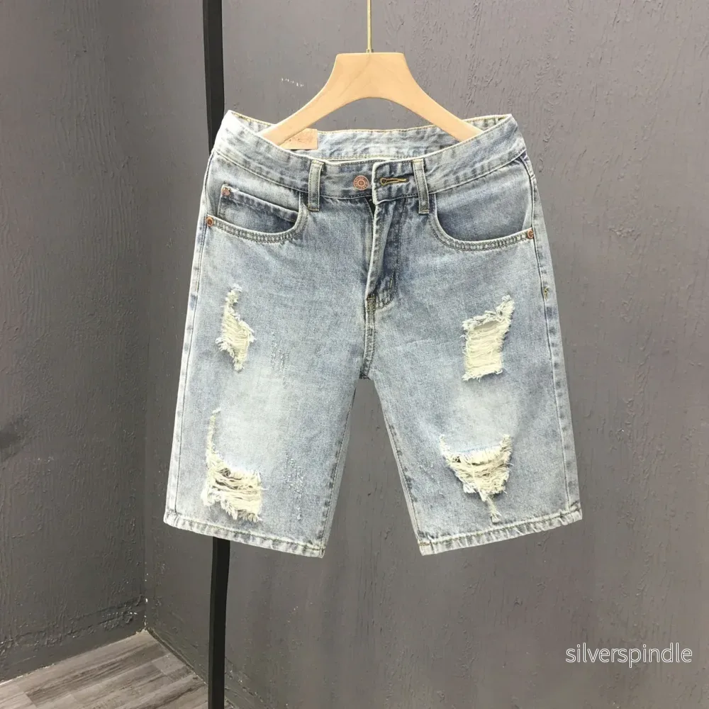 Ethan | Slitna Denimshorts med Mellanhög Midja Ethan | Slitna Denimshorts med Mellanhög Midja