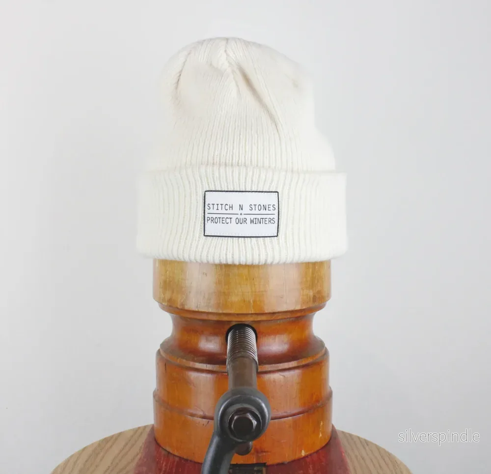 Protect Our Winters Beanie – Raw white Protect Our Winters Beanie – Raw white