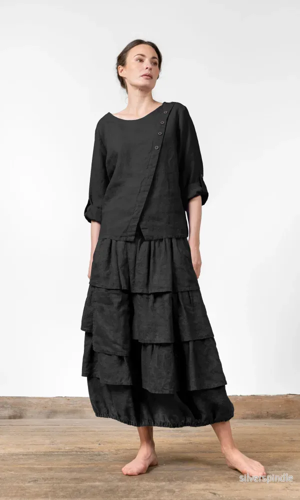 Blus med omlottknäppning i linne Blus med omlottknäppning i linne