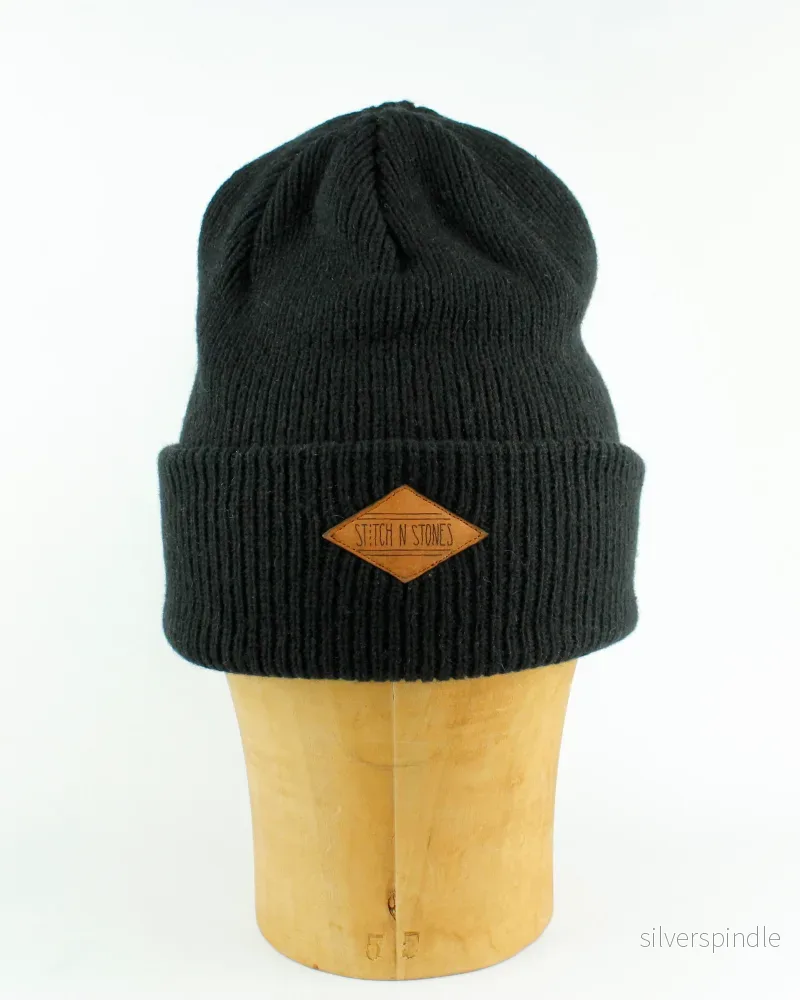 Lambswool Beanie with leather patch Lambswool Beanie with leather patch