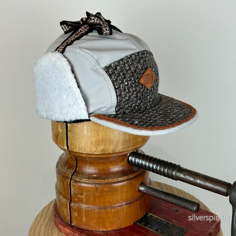 Vinterkeps barn 51-54cm – mönstrad med beige funktionstyg Vinterkeps barn 51-54cm – mönstrad med beige funktionstyg