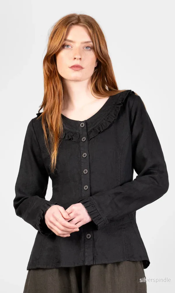 Blus med volanger och knäppning Blus med volanger och knäppning