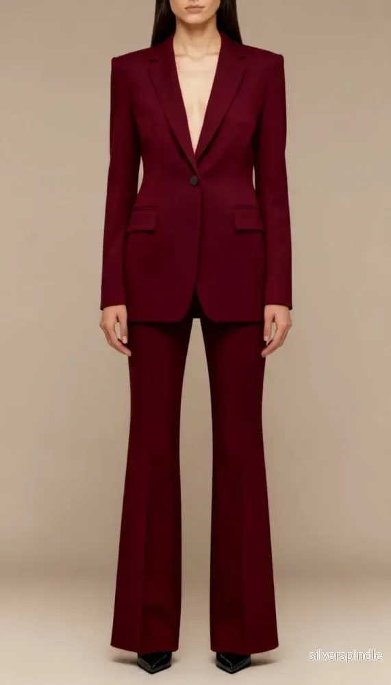 Elegant Tvådelad Kostym | Skulpterad Kavaj och Utsvängda Byxor | Modern Stil för Självsäker Look