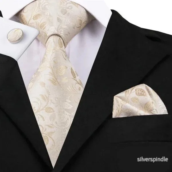 Elegant Blommig Slips i Vitguld med Matchande Fickruta & Manschettknappar | Perfekt för Formella Tillfällen