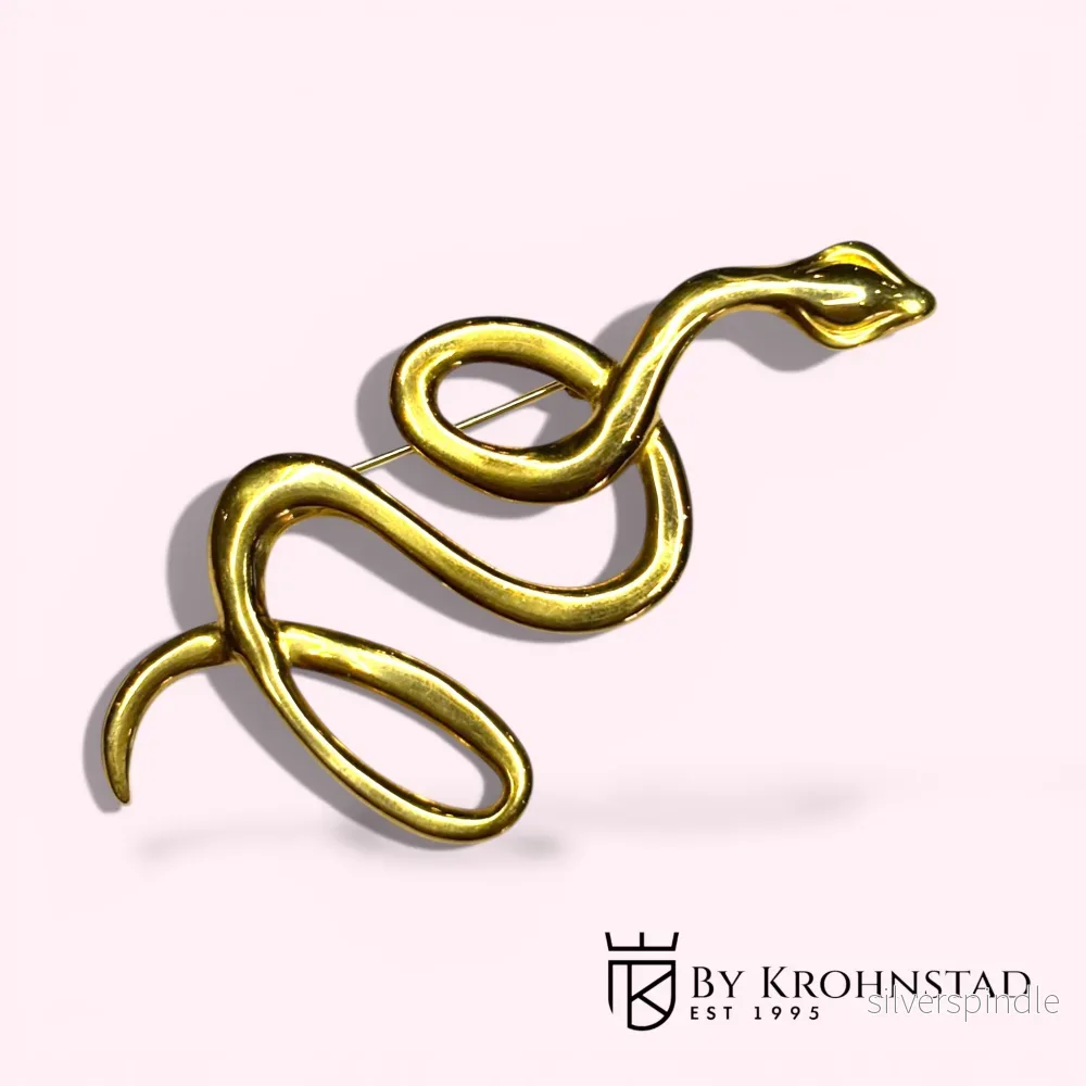 Gold snake brooch Gold snake brooch