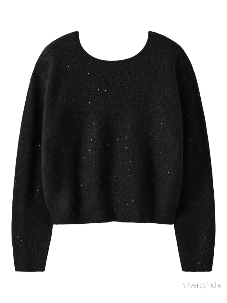 Stickad Glitter tröja medrosetter i ryggen Stickad Glitter tröja medrosetter i ryggen