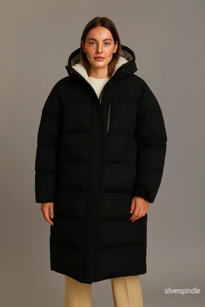 Kvinnors Longline Puffer Coat med Huva | Ultravarm Vinterjacka för Skydd och Komfort Kvinnors Longline Puffer Coat med Huva | Ultravarm Vinterjacka för Skydd och Komfort