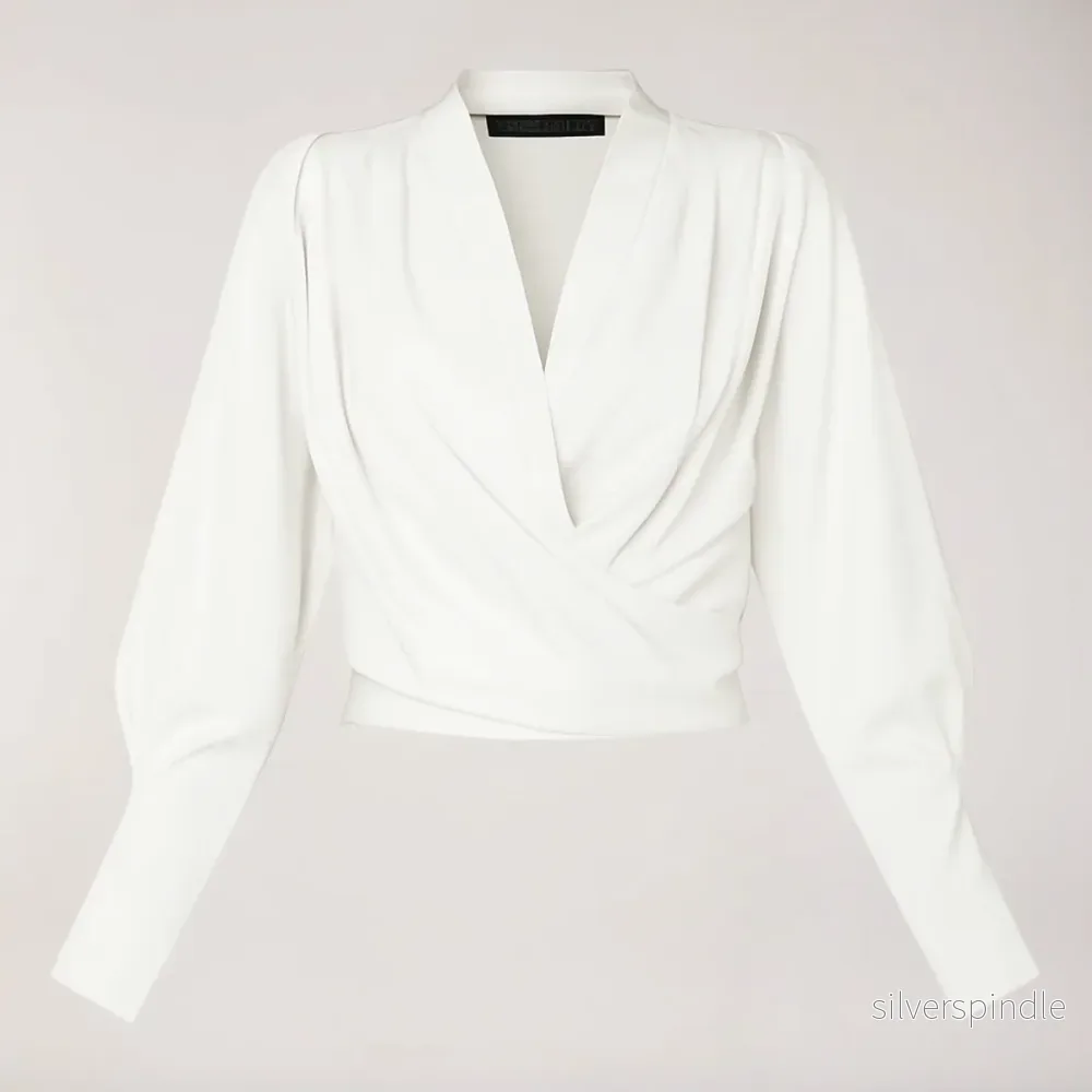 Elegant Blus | Damblus med V-ringning och Puffärmar i Satäng | Smickrande Passform för Stil och Komfort Elegant Blus | Damblus med V-ringning och Puffärmar i Satäng | Smickrande Passform för Stil och Komfort