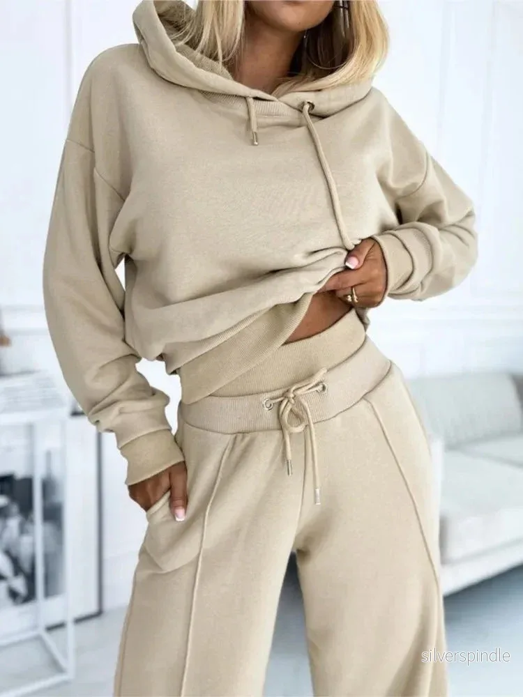 Träningsoverall Dam | Trendig Crop Top och Vida Byxor för Komfort och Stil Träningsoverall Dam | Trendig Crop Top och Vida Byxor för Komfort och Stil